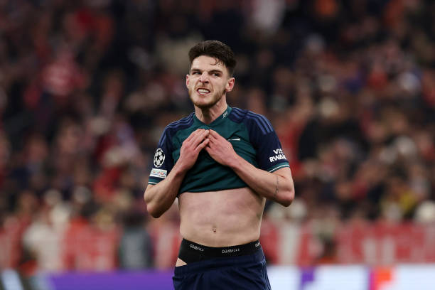 Declan Rice of Arsenal looks dejected during the UEFA Champions League quarter-final second leg match between FC Bayern München and Arsenal FC at...