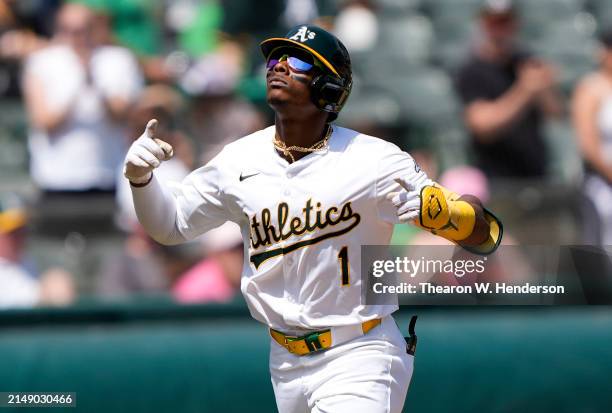 Esteury Ruiz of the Oakland Athletics celebrates after hitting a two-run home run against the St. Louis Cardinals in the bottom of the third inning...