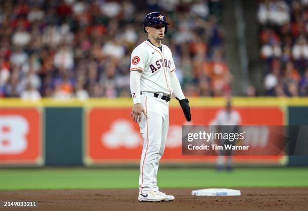 Alex Bregman of the Houston Astros leads off of second base in the first inning against the Atlanta Braves at Minute Maid Park on April 15, 2024 in...