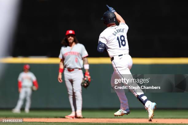 Mitch Garver of the Seattle Mariners celebrates his home run during the sixth inning against the Cincinnati Reds at T-Mobile Park on April 17, 2024...