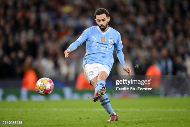 Bernardo Silva of Manchester City has the team's second penalty saved by Andriy Lunin of Real Madrid in the penalty shoot out during the UEFA...