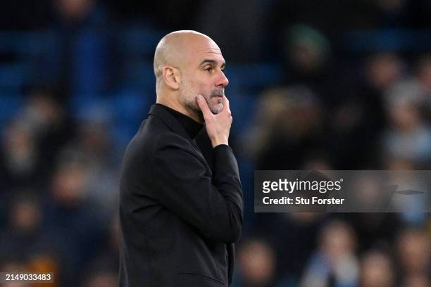 Pep Guardiola, Manager of Manchester City, reacts after the team's defeat in the penalty shoot out during the UEFA Champions League quarter-final...