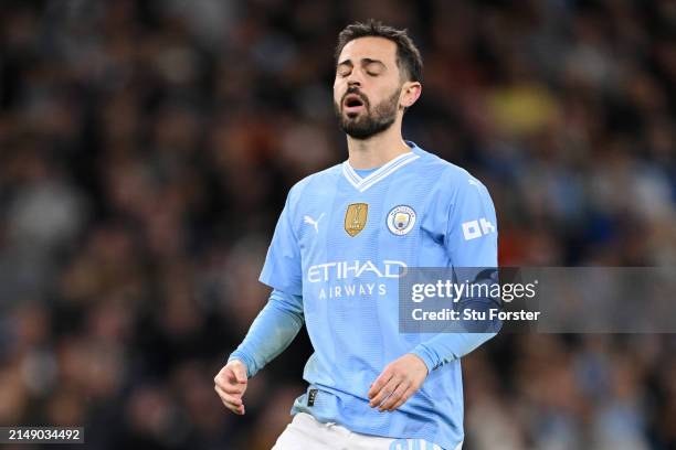 Bernardo Silva of Manchester City reacts after missing his sides second penalty in the penalty shoot out during the UEFA Champions League...