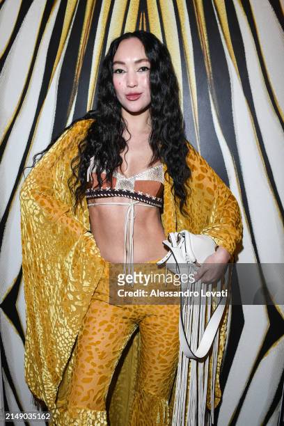 Korlan Madi attends the "Ray Of Gold" Home Collection presentation cocktail at Condé Nast Bistrot on April 17, 2024 in Milan, Italy.