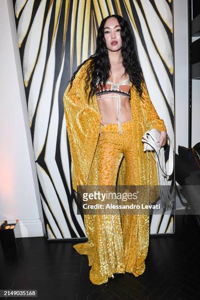 Korlan Madi attends the "Ray Of Gold" Home Collection presentation cocktail at Condé Nast Bistrot on April 17, 2024 in Milan, Italy.