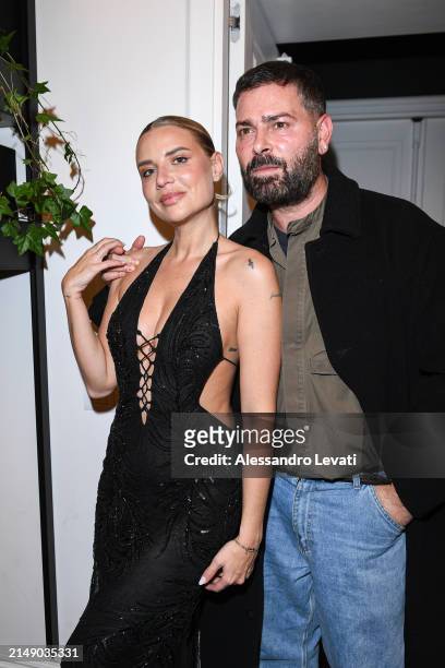 Veronica Ferraro and Fausto Puglisi attend the "Ray Of Gold" Home Collection presentation cocktail at Condé Nast Bistrot on April 17, 2024 in Milan,...