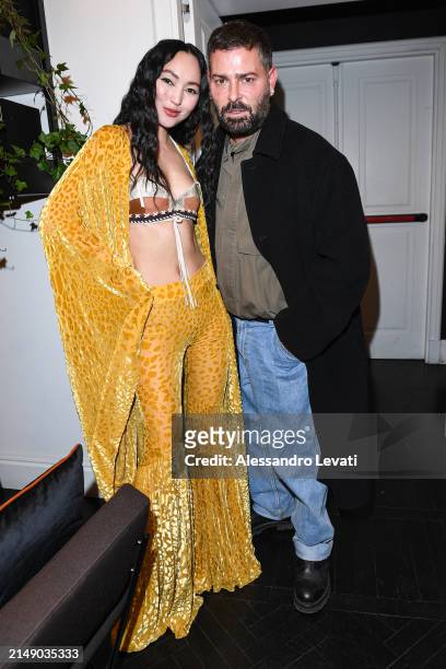 Korlan Madi and Fausto Puglisi attend the "Ray Of Gold" Home Collection presentation cocktail at Condé Nast Bistrot on April 17, 2024 in Milan, Italy.
