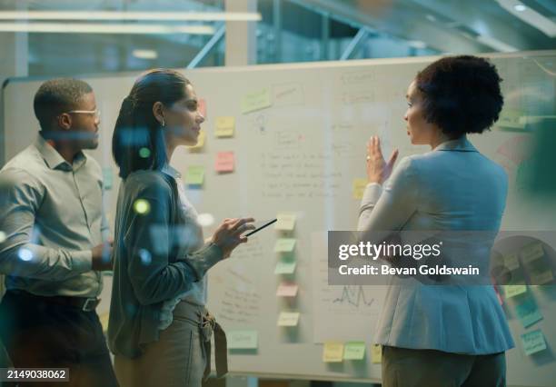 business people, brainstorming and note on whiteboard for teamwork, planning and invest strategy in office. data analyst, work and graph for collaboration, meeting and risk management in workplace - risk management stock pictures, royalty-free photos & images