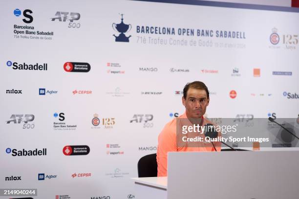 Rafael Nadal of Spain looks on during a press conference following his defeat against Alex de Minaur of Australia in the second round during day...