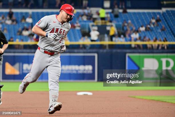 Mike Trout of the Los Angeles Angels rounds third base after hitting a home run in the first inning against the Tampa Bay Rays at Tropicana Field on...