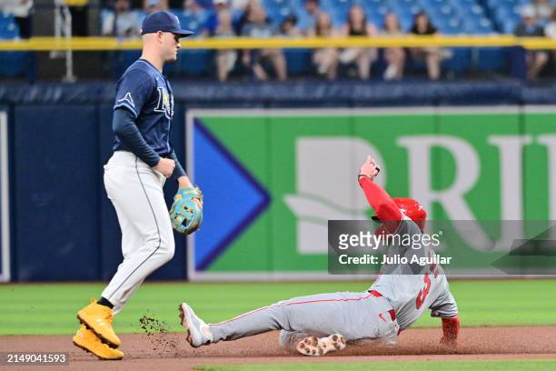 Taylor Ward of the Los Angeles Angels steals second base from under Curtis Mead of the Tampa Bay Rays in the first inning at Tropicana Field on April...