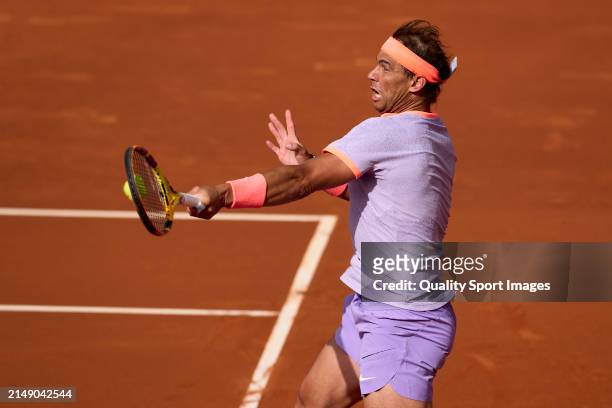 Rafael Nadal of Spain plays a forehand shot against Alex de Minaur of Australia in the second round during day three of the Barcelona Open Banc...
