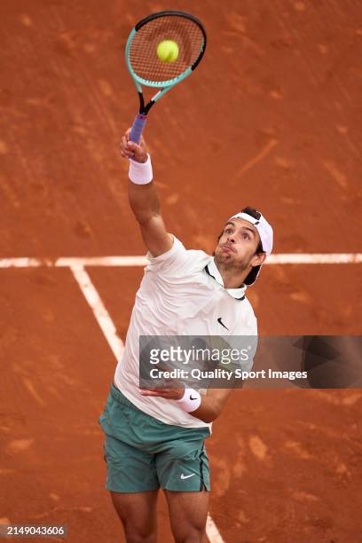 Lorenzo Musetti of Italy returns a ball against Roberto Carballes of Spain in the second round during day three of the Barcelona Open Banc Sabadell...