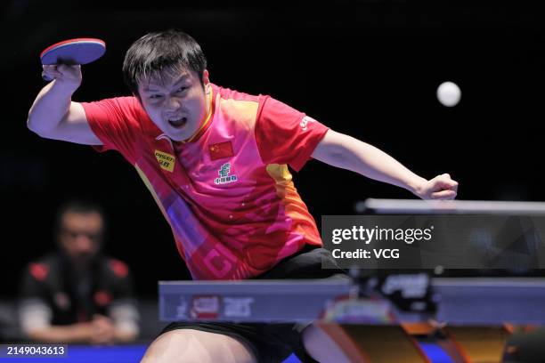 Fan Zhendong of China competes in the Men's Singles group match against Wong Chun Ting of Chinese Hong Kong on day three of ITTF Men's and Women's...