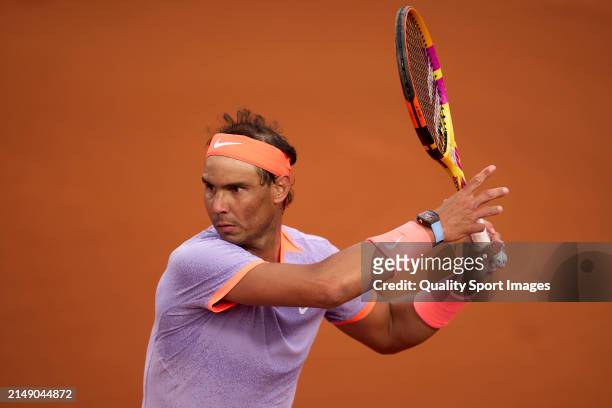 Rafael Nadal of Spain looks to return a ball against Alex de Minaur of Australia in the second round during day three of the Barcelona Open Banc...