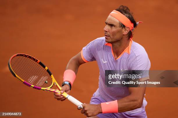 Rafael Nadal of Spain looks to return a ball against Alex de Minaur of Australia in the second round during day three of the Barcelona Open Banc...