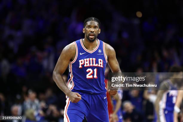 Joel Embiid of the Philadelphia 76ers reacts during the fourth quarter against the Miami Heat during the Eastern Conference Play-In Tournament at the...