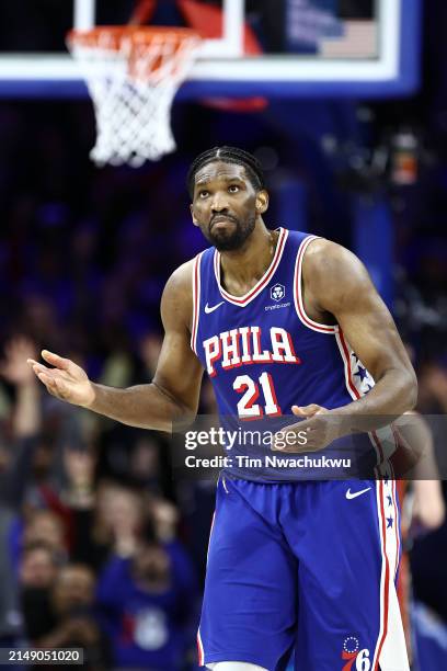 Joel Embiid of the Philadelphia 76ers reacts during the fourth quarter against the Miami Heat during the Eastern Conference Play-In Tournament at the...