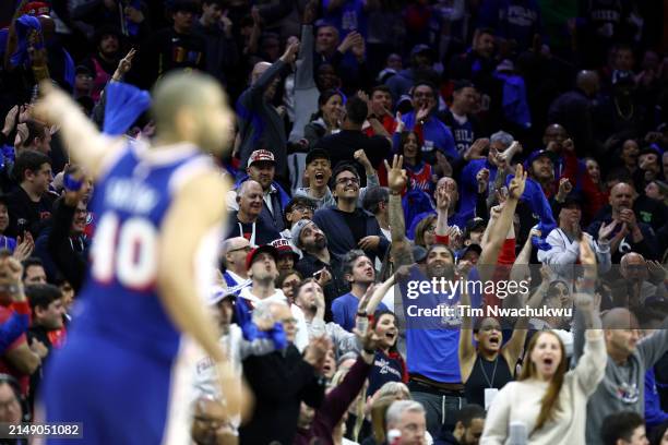 Fans react during the fourth quarter of the Eastern Conference Play-In Tournament between the Philadelphia 76ers and the Miami Heat at the Wells...