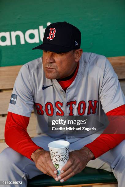 First Base Coach Andy Fox of the Boston Red Sox in the dugout before the game against the Oakland Athletics at the Oakland Coliseum on April 1, 2024...