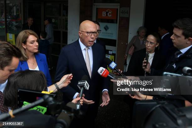 Australian Opposition Leader Peter Dutton speaks with the media after laying a flower tribute at the edge of Westfield Bondi Junction during a day of...