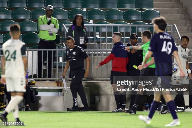 Referee Josiah Parke ejects assistant coach Amado Guevara of Carolina Core FC during the U.S. Open Cup third round game between North Carolina FC and...