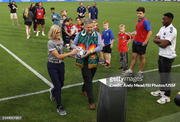 Team president Francie Gottsegen of North Carolina FC and team president Andy Smith of Carolina Core FC hold the match ball before the U.S. Open Cup...