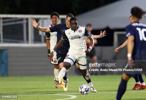 Yekeson Subah of Carolina Core FC controls the ball during the U.S. Open Cup third round game between North Carolina FC and Carolina Core FC at...