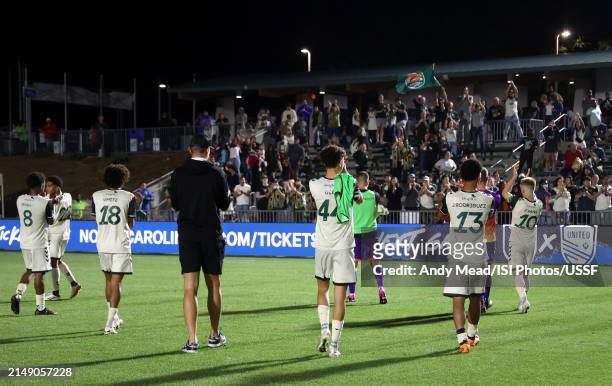 Carolina Core FC players salute their fans after the U.S. Open Cup third round game between North Carolina FC and Carolina Core FC at WakeMed Soccer...