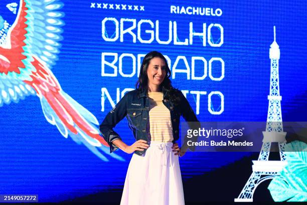 Former volleyball player Sheilla Castro presents the Brazilian Olympic Team uniform for the opening ceremony of the Paris 2024 Olympic Games during...