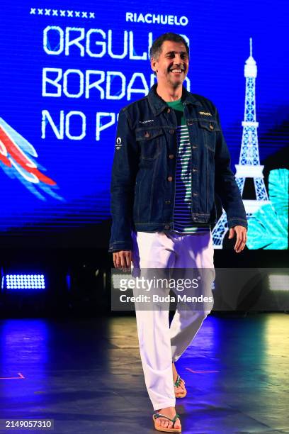 Former volleyball player Maurício Lima presents the Brazilian Olympic Team uniform for the opening ceremony of the Paris 2024 Olympic Games during an...