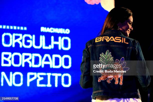 Brazilian volleyball player presents the Brazilian Olympic Team uniform for the opening ceremony of the Paris 2024 Olympic Games during an official...
