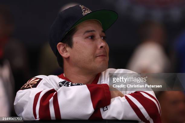 Fans of the Arizona Coyotes react following the NHL game against the Edmonton Oilers at Mullett Arena on April 17, 2024 in Tempe, Arizona. Tonight's...