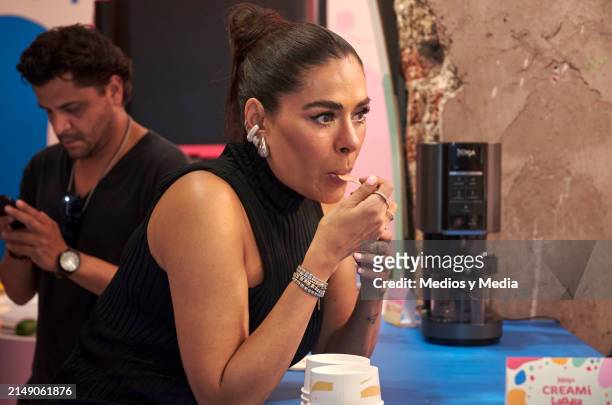 Galilea Montijo tries ice cream during the 'Creamilandia' Opening at colonia Juarez on April 17, 2024 in Mexico City, Mexico.