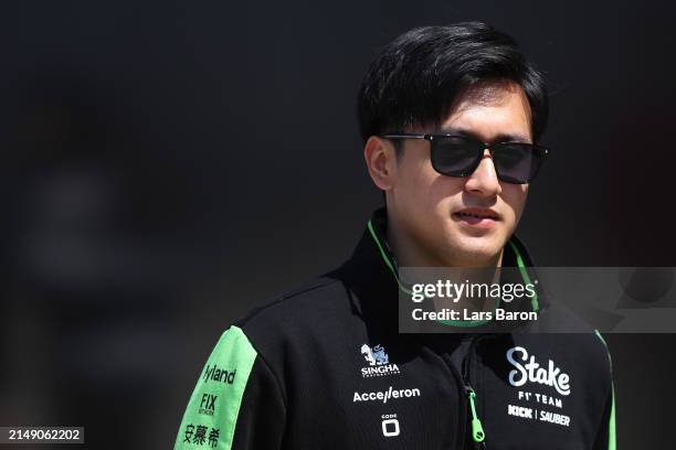 Zhou Guanyu of China and Stake F1 Team Kick Sauber walks in the Paddock during previews ahead of the F1 Grand Prix of China at Shanghai International...