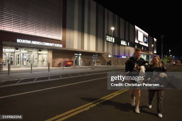 Fans of the Arizona Coyotes leave Mullett Arena following the NHL game against the Edmonton Oilers on April 17, 2024 in Tempe, Arizona. The Coyotes...