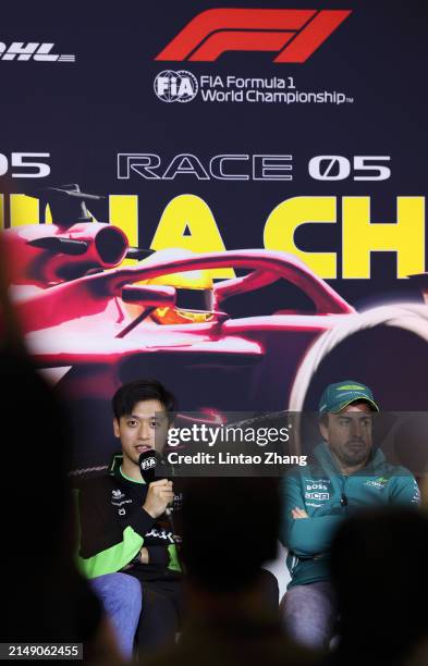 Zhou Guanyu of China and Stake F1 Team Kick Sauber and Fernando Alonso of Spain and Aston Martin F1 Team attend the Drivers Press Conference during...