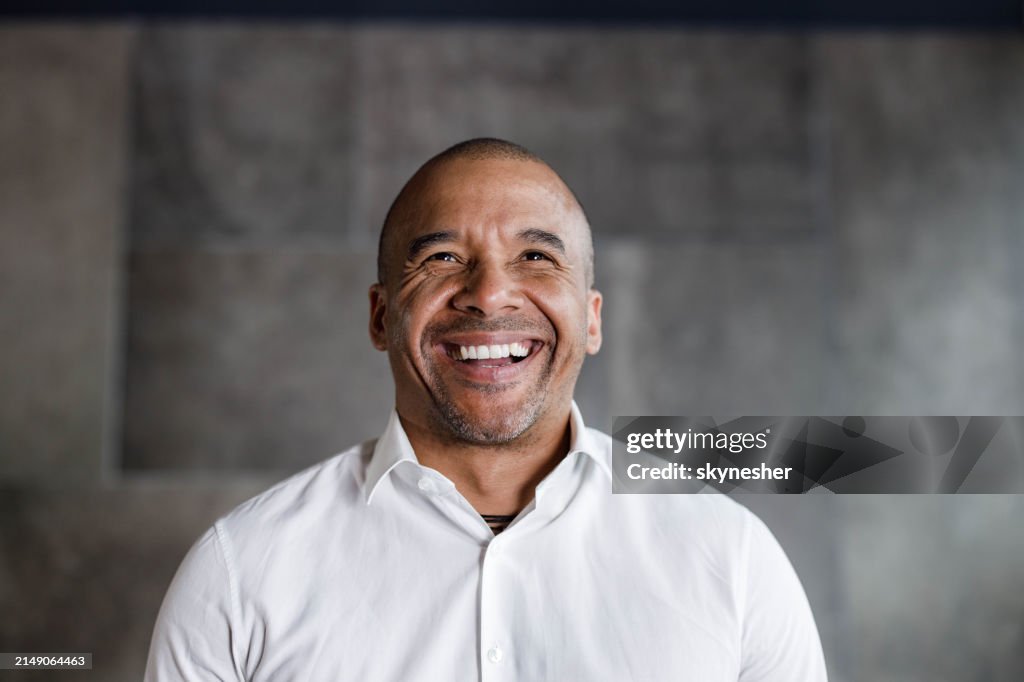 Portrait of happy black businessman.
