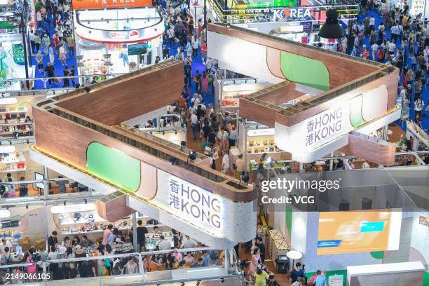 People visit the pavilion of Hong Kong during the 4th China International Consumer Products Expo at Hainan International Convention and Exhibition...