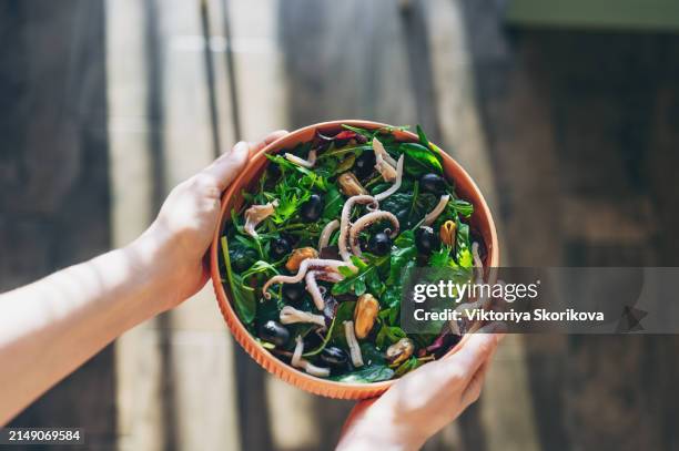 salad with seafood and vegetables on wooden table - yam plant stock pictures, royalty-free photos & images
