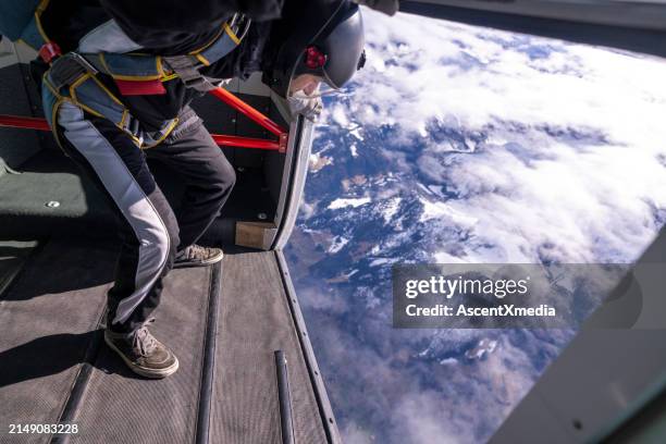 freefall jumper prepares to jump out of plane - jumping out of a plane bildbanksfoton och bilder