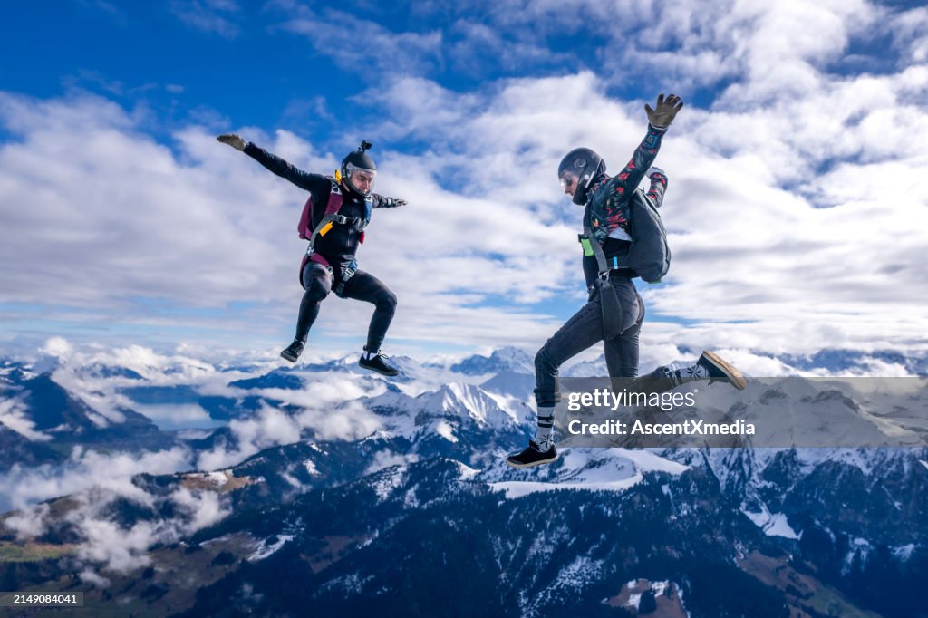 Freefall jumpers face each other mid-air