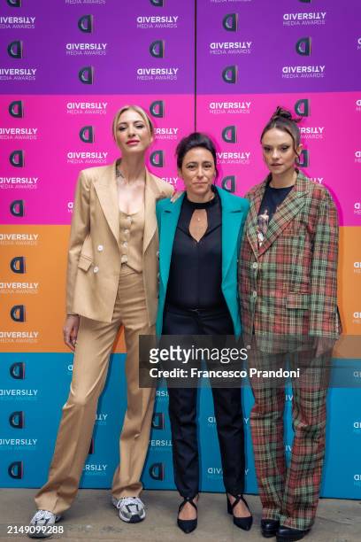 Ema Stokholma, Francesca Vecchioni, and Francesca Michielin attend the press conference photocall for the "Diversity Media Awards 2024" at Sala...