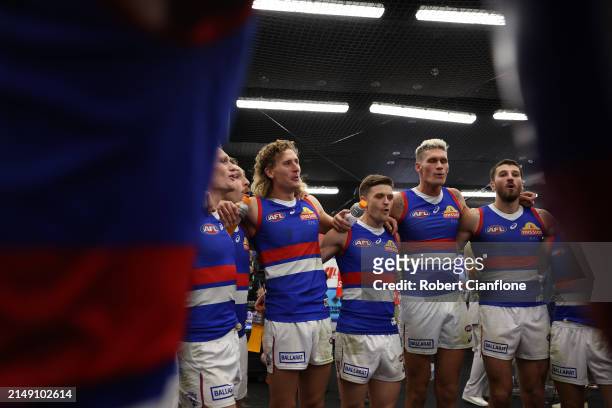 The Bulldogs celebrate after they defeaed the Saints during the round six AFL match between St Kilda Saints and Western Bulldogs at Marvel Stadium,...