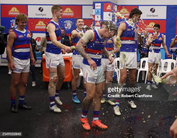 James Harmes of the Bulldogs celebrates with team mates after the Bulldogs defeated the Saints during the round six AFL match between St Kilda Saints...