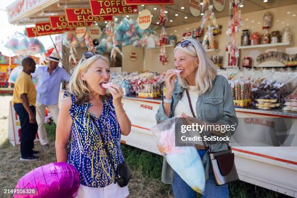 sweet treats at the fair - fairground stall stock pictures, royalty-free photos & images