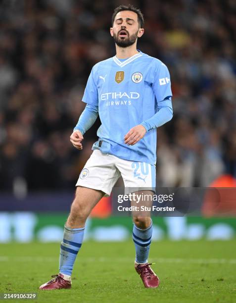 Manchester City player Bernardo Silva reacts after missing his penalty during the penalty shoot out during the UEFA Champions League quarter-final...