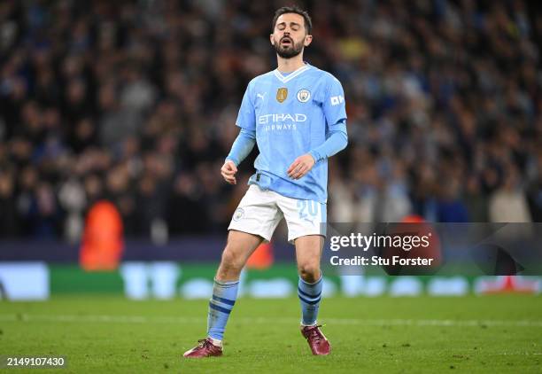 Manchester City player Bernardo Silva reacts after missing his penalty during the penalty shoot out during the UEFA Champions League quarter-final...