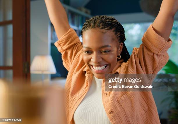 black woman, winner and home success with results or good news for online giveaway or prize on laptop. excited person with yes, celebration and achievement on internet, website or sign up competition - giveaway stock pictures, royalty-free photos & images