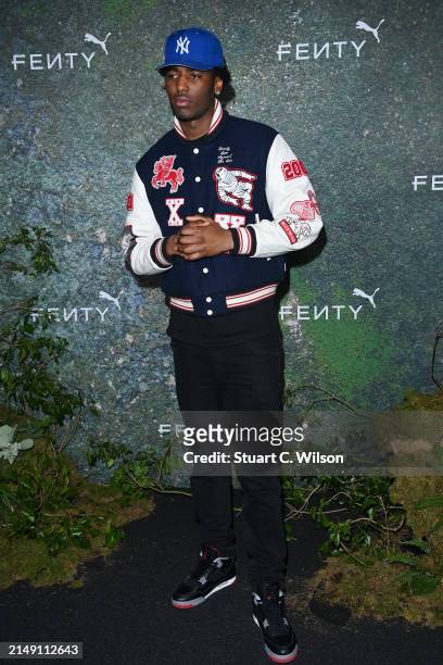 Guest attends the FENTY x PUMA Creeper Phatty Earth Tone Launch Party at Tobacco Dock on April 17, 2024 in London, England.